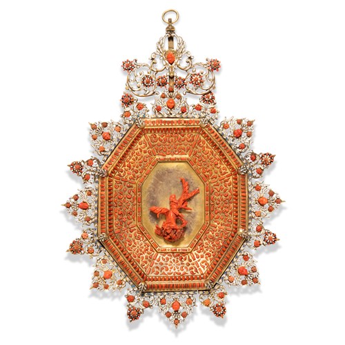 A Sicilian coral inlaid and gilt copper octagonal devotional plaque Capezzale with Saint Francis